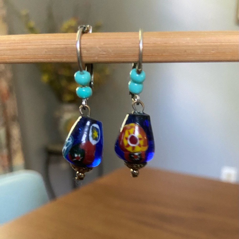 Vintage dangle earrings. Cobalt blue w/ colorful design glass bead. Safety backs